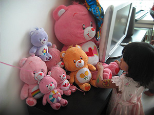 Cleo looking at Care Bears